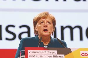 演説をするドイツのメルケル首相の写真